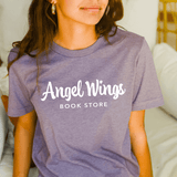Angel Wings Bookstore Horizontal T-Shirt T-shirt Color: Heather Purple $21.95 Winks Design Studio,LLC
