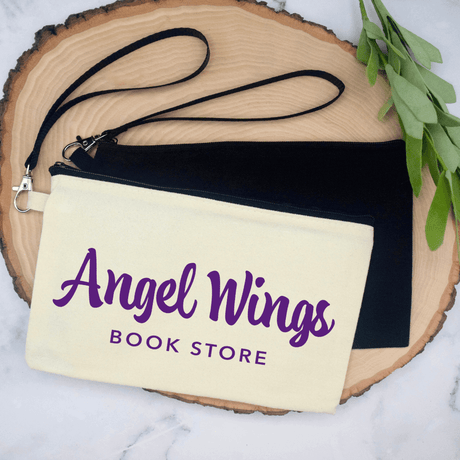 Angel Wings Bookstore Wristlet Cosmetic Bag Cosmetic Bag Color: Natural, Black $10.75 Winks Design Studio,LLC